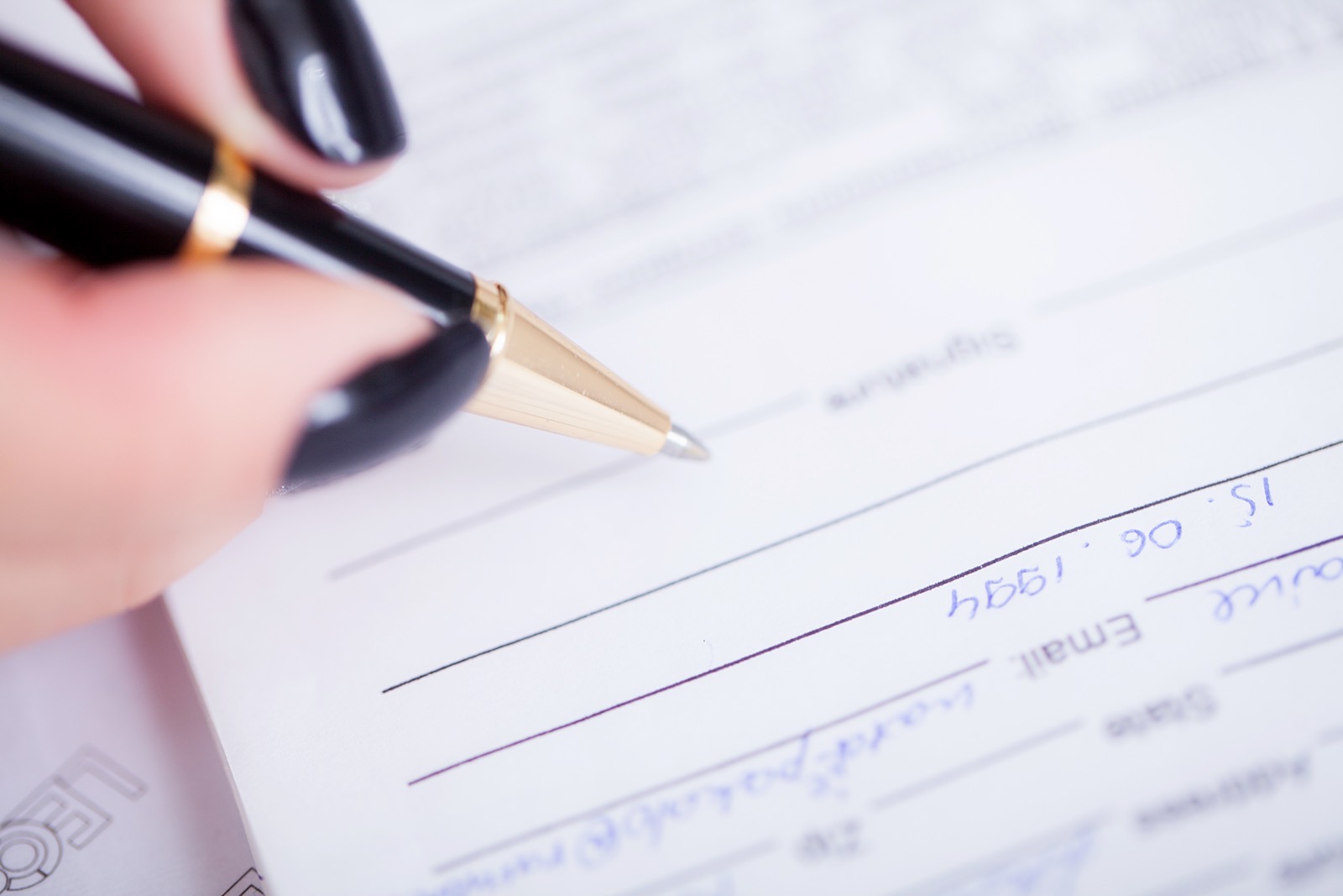 business woman signing a contract